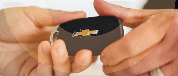 handing key to customer