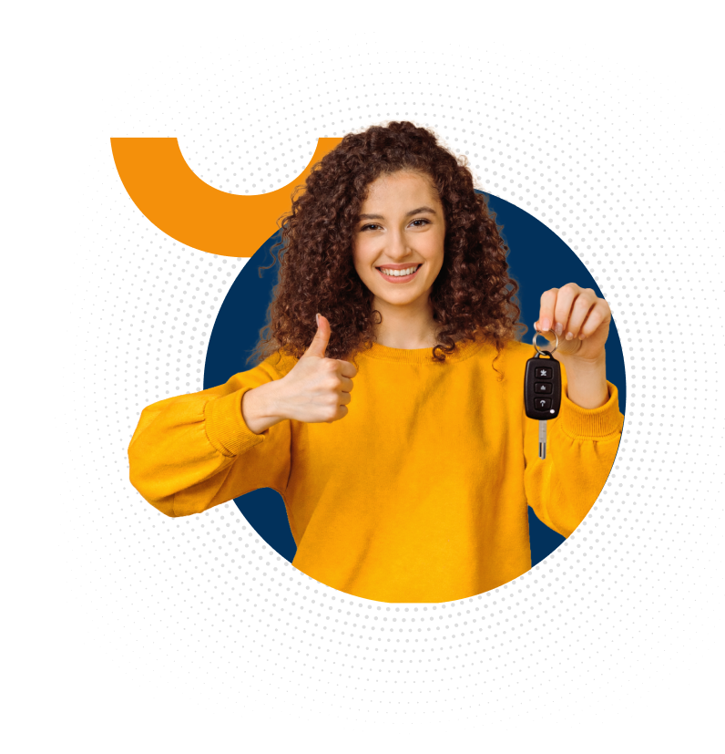 A smiling young woman with curly hair holds up a car key and gives a thumbs-up.